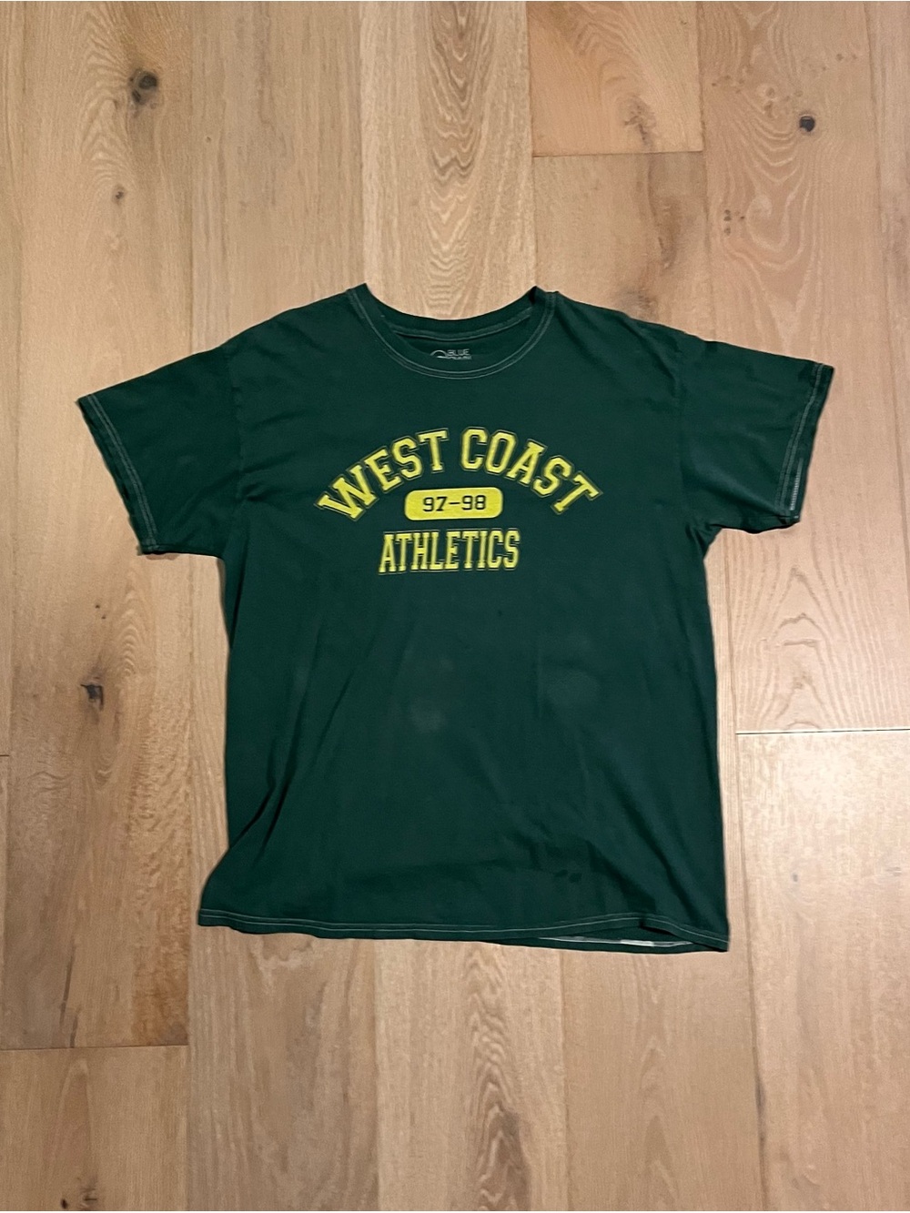 West coast athletics yellow center chest print darkish green light tee